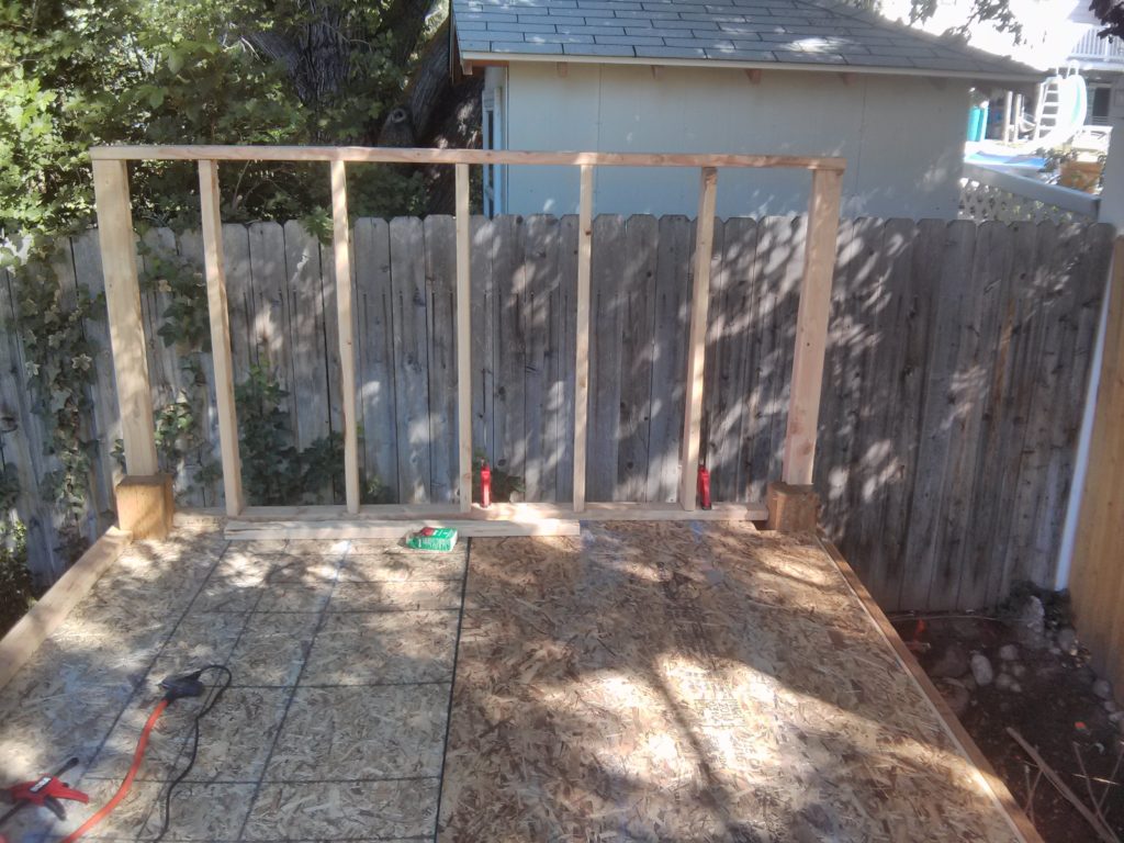 Here is the rear wall after I framed it and set it in place with clamps. Notice I forgot to cover it with the OSB.