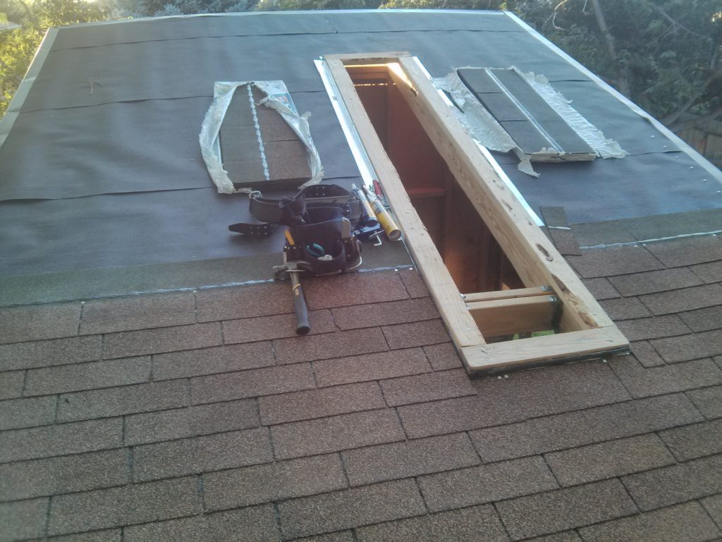 The skylight made shingling a little more challenging.