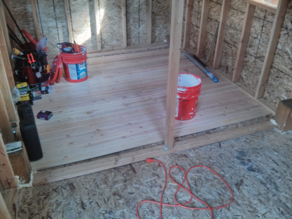 I used some 1x4's to create a new floor on top of the OSB that was already sagging.